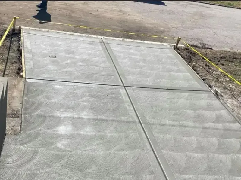 Completed concrete overlay with sealer on a Kansas City patio