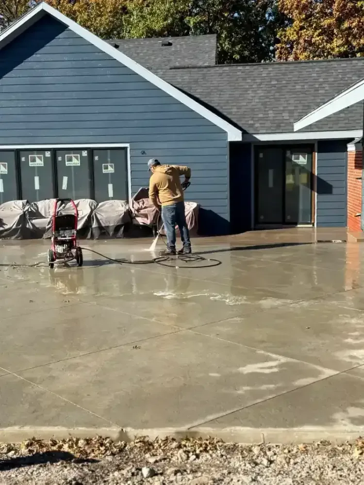 Stamped concrete patio installation around a pool area in Kansas City